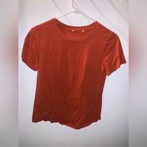 burnt orange shirt